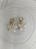 Boucles d'oreilles Monoï beige translucide